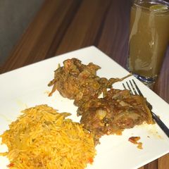A picture of Palm Oil Jollof Rice.