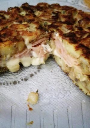 Una foto de Tortilla de papa RELLENA
