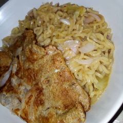 A picture of Indomie with fried egg.