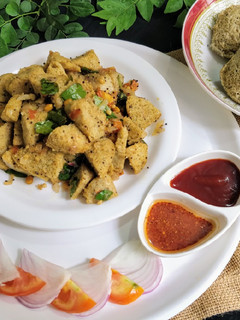 A picture of Navaratna Dal and Lentil Masala Idli.