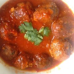 A picture of Meat balls in sauce.