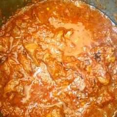 A picture of Tomatoes stew.