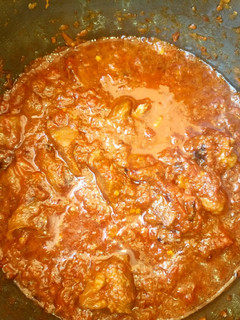 A picture of Tomatoes stew.