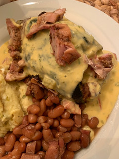 A picture of Poblano Pepper Stuffed with Grilled Chicken Covered with Queso.