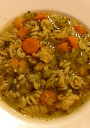 A picture of Chicken and vegetables soup.