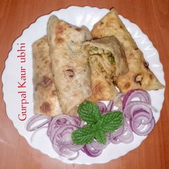A picture of French beans & potato wraps.