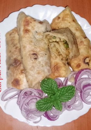 A picture of French beans & potato wraps.