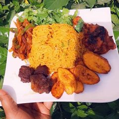 A picture of Mandi with chicken.