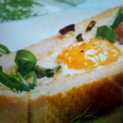 A picture of Fried eggs in ciabatta.