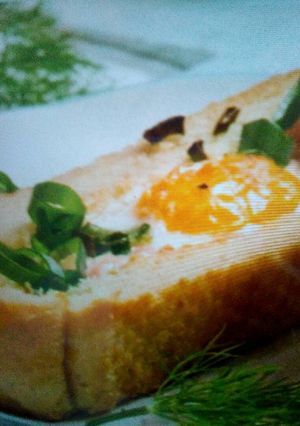 A picture of Fried eggs in ciabatta.