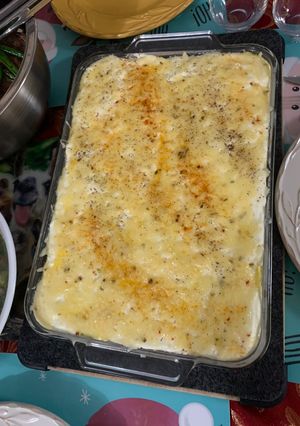 A picture of Baked rice with corn & cheese.