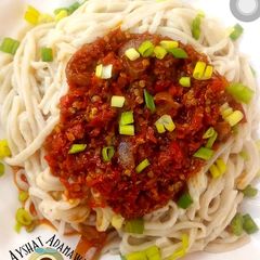 Hand made pasta with sauce A picture of Hand made pasta with sauce.