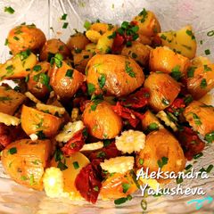 A picture of Warm potato salad with sundried tomatoes.