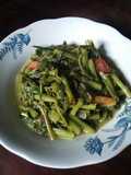Tumis kangkung asam sunti