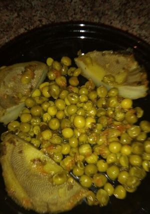 Une photo de Tajine de petit pois aux artichauts