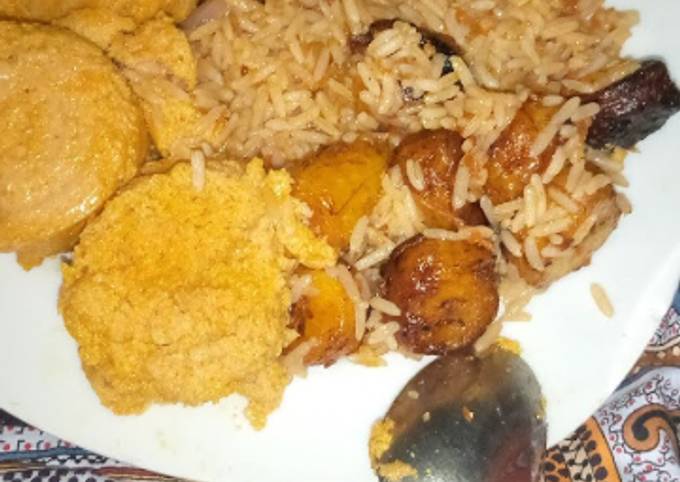 Jollof Rice with Moi-moi and fried plantain