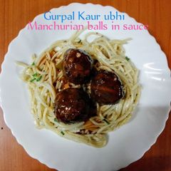 A picture of Mixed vegetables Manchurian Balls with sauce 🍅🌶️🧅🫑.