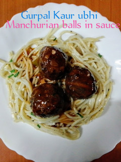 A picture of Mixed vegetables Manchurian Balls with sauce 🍅🌶️🧅🫑.