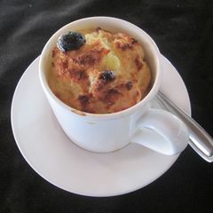 A picture of Bread And Banana Tea Cup Pudding.