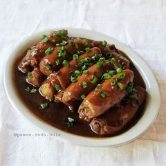 A picture of Mashed Potato Pork Rolls with Teriyaki Sauce.