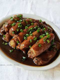 A picture of Mashed Potato Pork Rolls with Teriyaki Sauce.