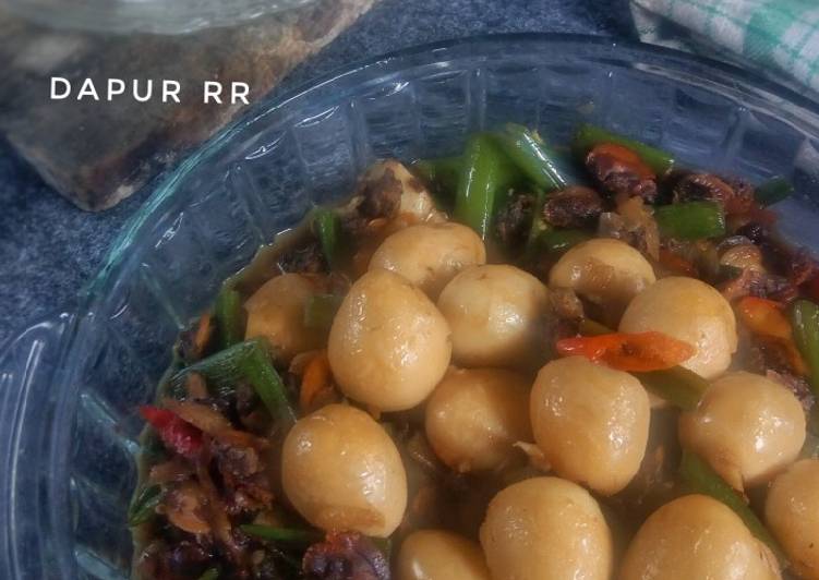 Tumis kerang telur puyuh bunga bawang