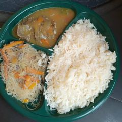 A picture of Boiled rice and chicken sauce and pasta.