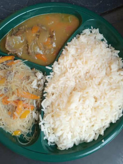A picture of Boiled rice and chicken sauce and pasta.