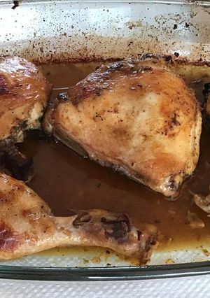 Una foto de Pollo horneado con jugo de mandarina