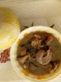 White soup with yellow garri