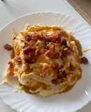 Ensaladilla de guanciale con crema de huevo curada