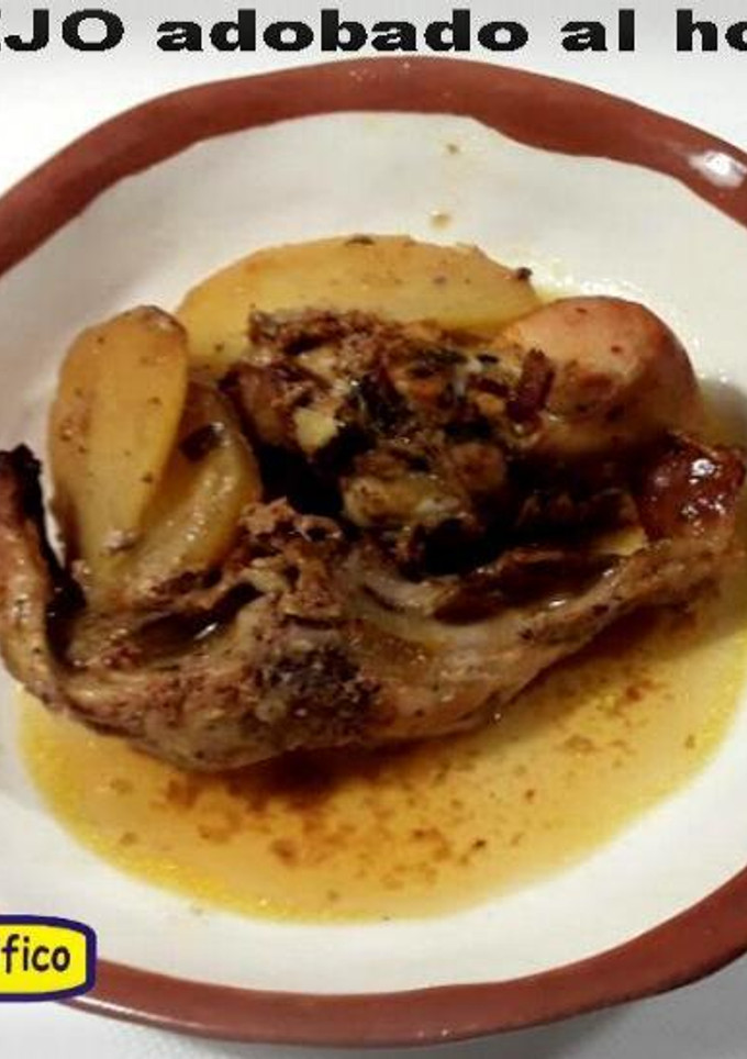 Una foto de Conejo adobado al horno