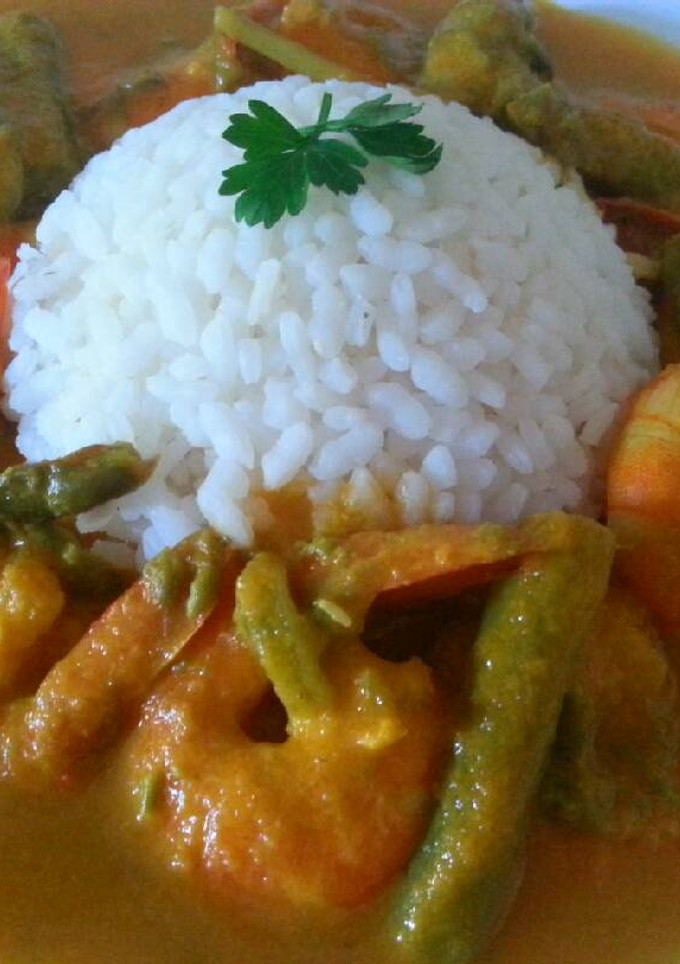 Una foto de Langostinos al curry