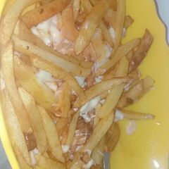 A picture of Cheesy fries.