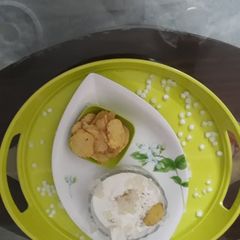 A picture of Rice dip with gold vitamin and potato chip.