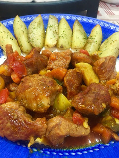 Una foto de Pavo estofado y patatas papillote