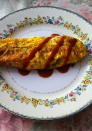 Una foto de Omelette con frijoles refritos