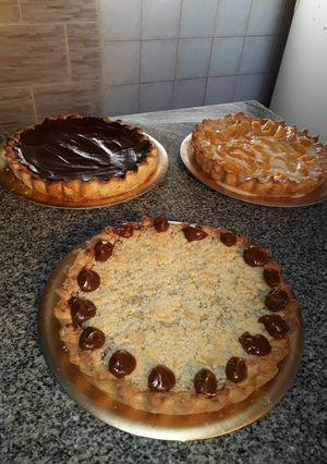 Una foto de Tarta Toffi, Tarta de coco con dulce de leche y Tarta de durazno