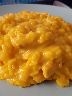 Una foto de Risotto de pollo con queso parmesano