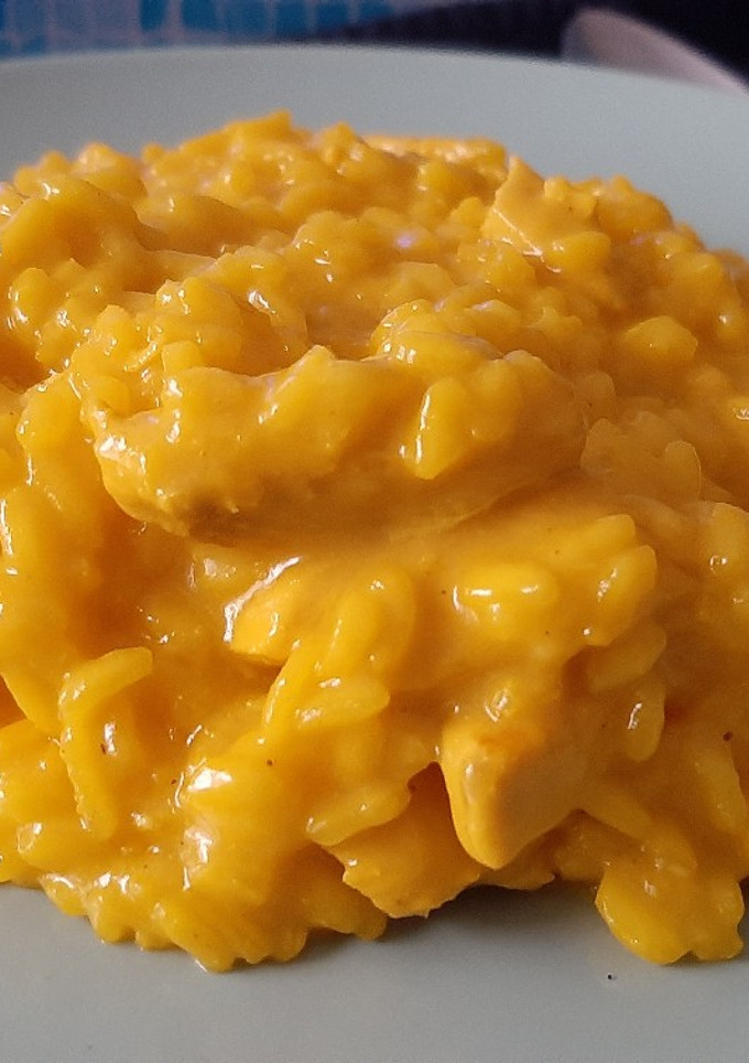 Una foto de Risotto de pollo con queso parmesano