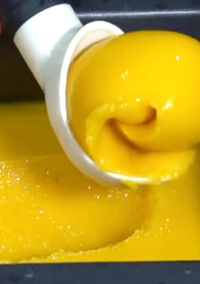 Una foto de Helado de mango y coco