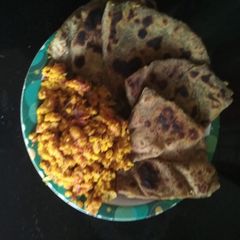 A picture of Paratha and paneer bhurji.