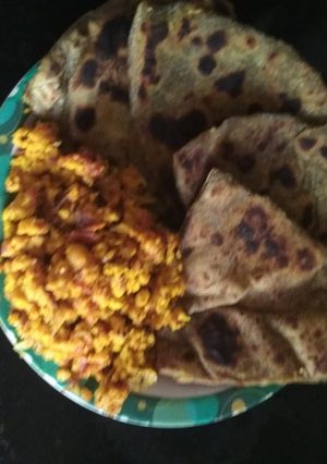 A picture of Paratha and paneer bhurji.