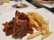 Una foto de bondiola de cerdo salsa barbacoa