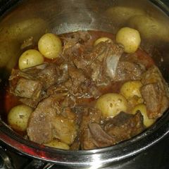 A picture of Beef stew a the baby potatoes.