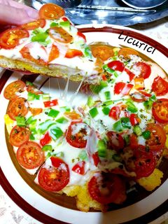 O poză a rețetei PizzaTart (tarta de pâine) la tigaie.