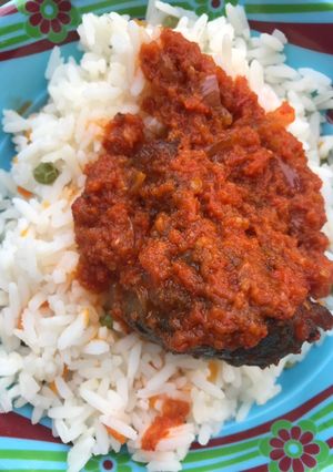 A picture of Stew and rice.