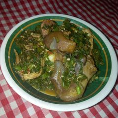 A picture of Okro soup with melon leaves.