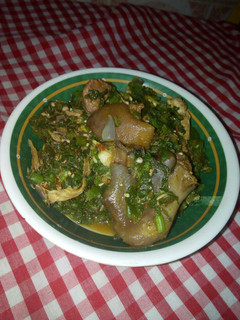 A picture of Okro soup with melon leaves.