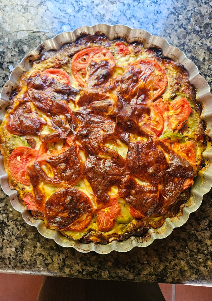 Una foto de Tarta de zucchini con tomates